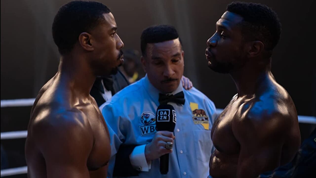 Damain (Jonathan Majors) and Creed (Micheal B. Jordan) facing off each other in a boxing match. From the movie Creed III (2023).