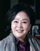 Kim Chang-sook as Gwi-nam's adoptive mother